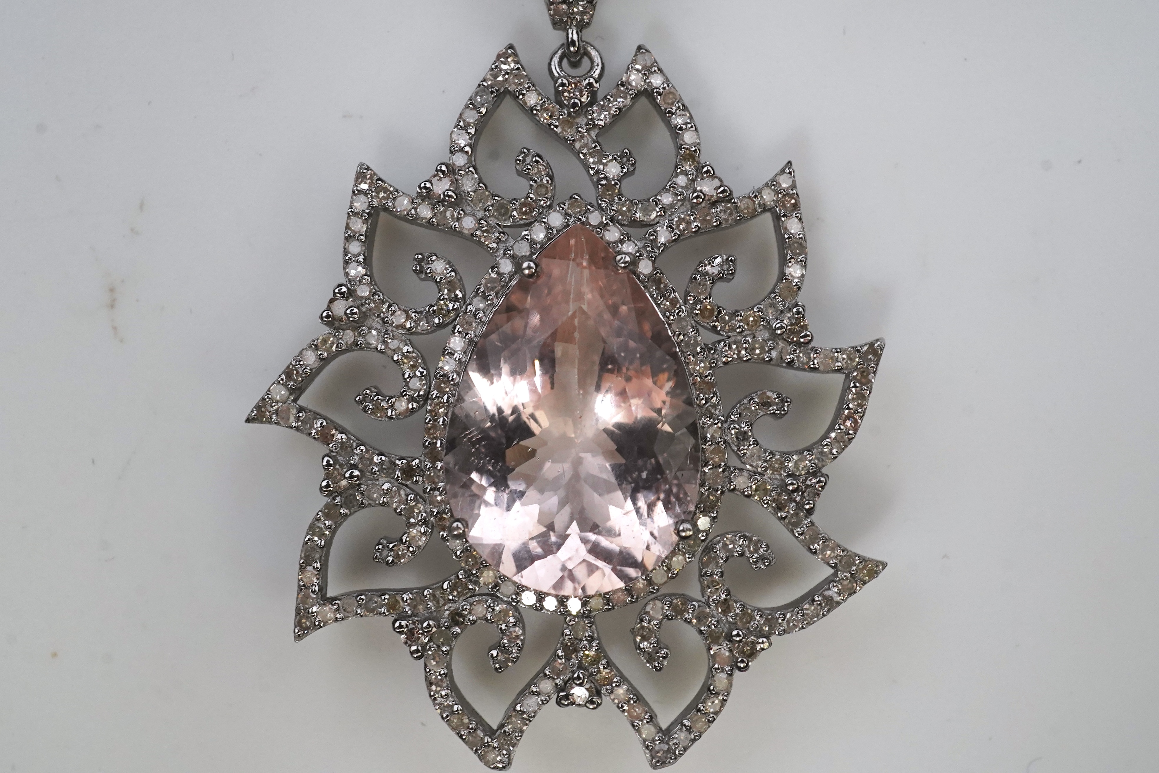 A morganite and diamond pendant